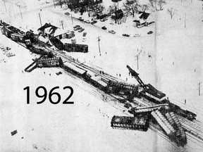 Cars scattered along the tracks blocked the New York Central line for six hours after 22 cars of a 76-car freight were derailed Christmas Eve (1962). Work crews toiled through the night to get traffic moving again on the line. The magnitude of their task is indicated by this aerial view of the wreck, looking west towards Tillson Ave. FRANK RUBIE PHOTO