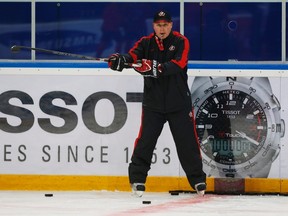 Canada's head coach Steve Spott directs his team during a practice session for the 2013 IIHF U20 World Junior Hockey Championship in Ufa, January 2, 2013. (REUTERS/Mark Blinch)
