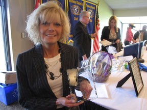 Joanne Klauke Labelle, the founder of Harmony for Youth, was honoured by the Seaway Kiwanis Club on April 10, 2012 at the Sarnia Golf and Curling Club in Sarnia, Ont. Along with a plaque to honour Klauke Labelle for her contributions to the community, the service club has established an annual scholarship at Sarnia Collegiate in her name. (PAUL MORDEN, The Observer)