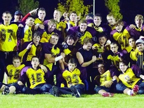 Wetaskiwin Composite High School Sabres football team celebrates after capturing the Highway 13 Bowl trophy over arch-rivals, the Camrose Trojans. The Sabres went on to have a banner year, which included an appearance in the league B side championship game.