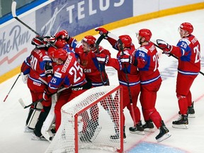 Russia's players celebrate defeating Switzerland in a shootout during their quarterfinal game at the World Junior Hockey Championship in Ufa, Russia, on Jan. 2, 2013. (Mark Blinch/Reuters)
