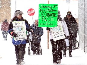 Tania Cameron (left) and Marlene Elder were among four teams of demonstrators handing out leaflets throughout Kenora on Wednesday as part of a one-day "economic fast" that called First Nations people to boycott all local businesses. 
JON THOMPSON/Daily MIner and News