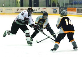 Jena Movoid of the Fort Saskatchewan Junior Fury tries to sneak through two Thorsby Thunder defenders earlier this season. The local ladies had a bye week for Round 1 of playoffs, but are now preparing to play either the Thunder or the Irma Chargers in Round 2.
Photo by: Ben Proulx/ Fort Saskatchewan Record/ QMI Agency