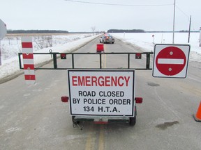 Mandaumin Road, at Petrolia Line, was closed by the OPP Wednesday following the discovery, at about 11:30 a.m., of an adult female body in a woodlot. The section of Mandaumin Road, from Petrolia Line to Rokeby Line, was expected to remain closed overnight and Thursday. Sarnia, Ont., Jan. 2, 2013 PAUL MORDEN/THE OBSERVER/QMI AGENCY