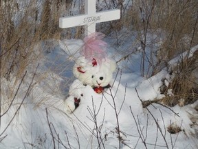 A memorial to Stefanie Cummings set up on O'Neil Drive West in Garson. Cummings' body was found at the side of the road in October. (Photo supplied to The Sudbury Star)