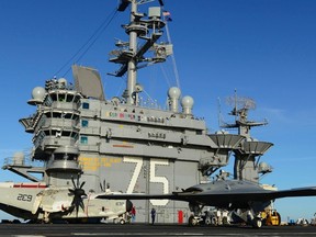 The X-47B Unmanned Combat Air System (UCAS) demonstrator taxies on the flight deck of the aircraft carrier USS Harry S. Truman in the Atlantic Ocean in this December 9, 2012 handout photo obtained by Reuters December 10, 2012. Harry S. Truman is the first aircraft carrier to host test operations for an unmanned aircraft. (REUTERS/U.S. Navy/Northrop Grumman Corp/Alan Radecki/Handout)