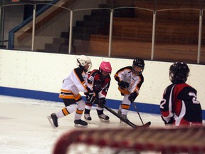 Fairview Chiropractic Novice players make a goal attempt during their game against Sexsmith during the mini-tournament hosted by the Fairview novice teams Dec. 29. (Chris Eakin/Fairview Post)