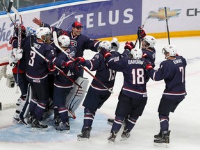 USA celebrates after defeating Canada in their semi-final game at the 2013 IIHF U20 World Junior Hockey Championship in Ufa January 3, 2013. REUTERS/Mark Blinch (RUSSIA  - Tags: SPORT ICE HOCKEY)