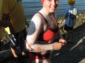 Annaleise Carr, 14, of Walsh became the youngest person to swim across Lake Ontario after she emerged from the water in Toronto around 8:57 p.m, on Aug. 19. The 51.1 km adventure took her 27 hours to complete. Along the way she raised more than $50,000 for Camp Trillium near Waterford. Donations continued to poor in following the swim. (PENNY COLES / QMI Agency)