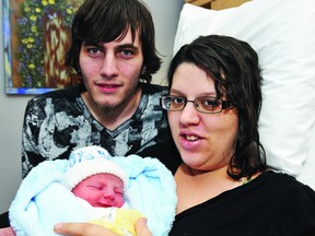 Parents James Cass and Jordan Wheeler welcomed their newborn son Axton - the first baby born in Brockville in 2013 - at 1:44 p.m. on Thursday, January 3. (DARCY CHEEK/The Recorder and Times)