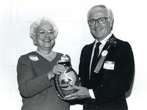 Submitted Photo

In 1987, Sarah "Sally" Munroe receives a Marquis Award and the gift of a specially-commissioned piece of art from Talking Earth Pottery of Ohsweken, from Joe Wiacek, past-president of the then St. Joseph's Hospital Foundation.