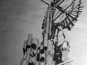 Sculptor Bob Oldrich puts the finishing touches on his creation of a windmill for High River’s Pioneer Square redevelopment in this photo from January 1972.