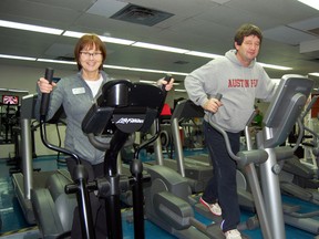 Program coordinators at the Tillsonburg Community Centre, Donna Burditt; left and Ron Becht; right, demonstrate eliptical machines at the Health Club. With the New Year upon us, many people are setting goals to lose weight and get in shape as part of their New Year's resolutions. Tillsonburg residents are encouraged to sign up for a special 10-week program 'The Best Loser' beginning January 14, 2013. For more information call: (519) 688-9011. KRISTINE JEAN/TILLSONBURG NEWS/QMI AGENCY