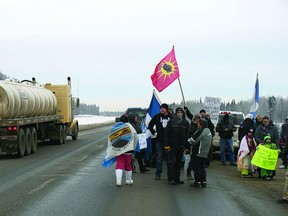 Aboriginals protest the federal government’s omnibus budget Bill C-45, which changes resource policies and land use on Dec. 20, 2012. The protesters say the bill was passed without indigenous consultation and ignores existing treaties between the Crown and Canada’s First Nations.