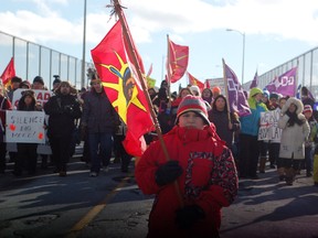 A young boy leads a march across the Seaway International Bridge into Cornwall, Ont., as part of an Idle No More protest.

CHERYL BRINK/CORNWALL STANDARD-FREEHOLDER/QMI AGENCY