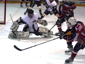 Kirkland Lake Gold Miners' goalie Chris Komma makes this great save during Saturday's 4-1 loss to North Bay