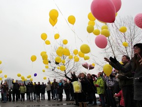 Dozens of people gathered at Centennial Park in Sarnia, Sunday afternoon for a balloon release held to honour the life of 27-year-old Noelle Paquette. TARA JEFFREY/THE OBSERVER/QMI AGENCY