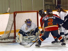 North Bay Ice Boltz goalie Alexx Ridding fights off a Shark attack for a 2-1 win over Barrie in Midget AA hockey, Sunday at Pete Palangio Arena. (MARIA CALABRESE The Nugget)
