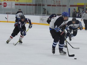 Jamie Parker of the Port Dover Pirates Midget Team #1 heads towards the net against the Elmvale Coyotes during a tournament final in Delhi on Sunday, Jan. 6, 2013. Port Dover lost the game 3-2 in overtime. DANIEL R. PEARCE  Simcoe Reformer