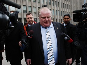 Mayor Rob Ford leaves 361 University courthouse after taking the tunnel between Osgoode Hall and the courthouse. Ford was in appeals court Monday January 7, 2013 in his conflict of interest trial. (Craig Robertson/Toronto Sun)