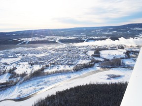 The Town of Whitecourt can be clearly seen off the wing of John Burrow’s Piper Cherokee 120 shortly after taking off on a sight seeing flight from the Whitecourt Airport on Dec. 30.