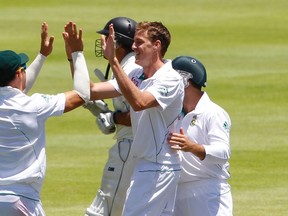 South African players celebrate taking a New Zealander's wicket during play last week. (REUTERS)