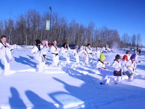 The Whitecourt Taekwondo Club does their annual practice in the snow on New Year’s Day. The club has followed the tradition for more than 25 years.