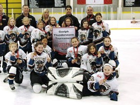 The Chatham Atom 'A' Outlaws won their division at the Guelph Thunderstorm Tournament on Sunday. The Outlaws are, front row, left: Gillian Krekewich, Jaiden Rollings, Reese Parks, Jordan Smith, Natalie Bray, Jocelyn Maryschak and Elizabeth Elders. Middle row: Ashlee Roberts, Arisa Hansen, Emma Doom, Emily Arn, Hailey McMahon, Carly Belanger, Olivia Caines, Hunter Twigg and Sophie Maine. Back row: assistant coach Joel Belanger, assistant coach Dave Maine, trainer/manager Charlene Parks, head coach Brad Twigg and assistant coach Shawn Smith. (Contributed Photo)