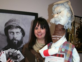 Johnny Jones, a prospector photographed during the early days of the Porcupine camp, has fittingly become the face of Cabin Fever – an annual fundraiser and winter social hosted Downtown Timmins Business Improvement Association. Stacey Martin, administrative assistant with the BIA, displays some of the tickets that are available for the upcoming event which is being held at the Dante Club on Friday, Jan. 25.