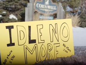 An Idle No More sign sits in a snowbank in Cornwall's traffic circle after protesters crossed the Seaway International Bridge into the city on Saturday.
CHERYL BRINK/CORNWALL STANDARD-FREEHOLDER/QMI AGENCY