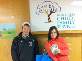 Bruce County RFC teammates, families, and friends assisted Bruce-Grey Child and Family Services in December, 2012 by providing 13 snow suits for children across Bruce and Grey Counties and raised $420 to purchase Christmas dinners for families less fortunate. Bruce County RFC executive members Jason Liddle and Jacqueline Hooker made the drop off in Walkerton. (SUBMITTED)