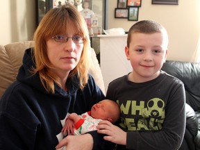 Nicole McClellan, her son Logan and partner Dwayne Bates (not pictured) welcomed Paris' first newborn baby of 2013, Erica Lynne Bates, on Tuesday, Jan. 1 at 3:27 p.m. in the Brantford General Hospital. Erica weighed 7 pounds. MICHAEL PEELING/THE PARIS STAR/QMI AGENCY
