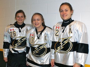 Tonisha Maisonneuve, centre, with North Bay Compuware Grant Propane 'AA' Midget Ice Boltz teammates Julie Vaillancourt, left, and Corie Jacobson. Maisonneuve has earned a women's hockey scholarship to play and study at York University.
THE NUGGET/QMI AGENCY