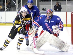 Kingston Frontenacs Billy Jenkins looks for the puck in front of Kitchener Rangers goalie Franky Palazzese during Ontario Hockey League action at the K-Rock Centre on Friday October 12 2012. IAN MACALPINE/KINGSTON WHIG-STANDARD/QMI AGENCY