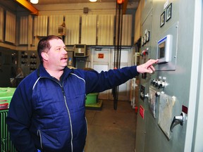 Ed Malcomson, the city's wastewater systems supervisor, explains the workings of an interface inside the main sewage pumping station at Centeen Park. RONALD ZAJAC The Recorder and Times