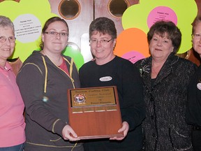 Linda Stykel (left) event co-chairwoman of Trenton Curling Club's annual ladies Flower Power Bonspiel, held last weekend, is joined by the 'A' event winners from TCC — Liz Griffiths (lead), Megan Bridger (second), Melanie Harder (vice), and Barb Sopaz (skip), and event chairwoman Arduth Paquette.