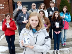 Brighton Leo member Kelsey Moorewood holds an ENSS Spread the Net jar, one of many jars which were distributed to local businesses in Brighton Monday afternoon. The Leos have organized the Spread the Net campaign at ENSS, which aims to collect funds to help distribute bed nets in Africa.
EMILY MOUNTNEY/TRENTONIAN/QMI AGENCY