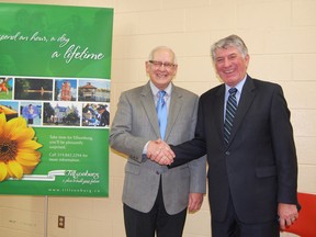 Member of Parliament for Oxford, Dave MacKenzie; right and Tillsonburg Mayor John Lessif; left were all smiles during a press conference Tuesday afternoon announcing federal funding for the Tillsonburg branch of the Oxford County Library. The library will receive $276,723 in upgrades this spring, under the Community Infrastructure Improvement Fund (CIIF) and go towards renovations including many additional features such as a hot beverage bar and a children’s section filled with toys and interactive educational activities.

KRISTINE JEAN/TILLSONBURG NEWS/QMI AGENCY