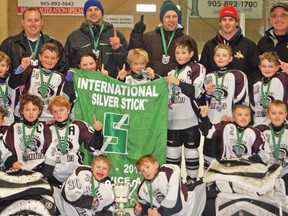 Celebrating their Pelham Regional Silver Stick tournament championship on Dec. 29 are the Tillsonburg Wardís Automotive novices. From left are (front) Tristin Zeller, Tyler Bouck, (2nd row) Beau Jelsma, Brandon Balazs, Hayden McLean, Liam Hicks, Brandon Homick, (3rd row) Owen Harris, Michel Laundrie, Mallory Collins, Eli Newson, Nolan McCrossin, Devin Hawley, Travis Lamb, (back row) Darryl Homick, Ryan Balazs, Duane Harris, Trevor Lamb and Scott McLean. CONTRIBUTED PHOTO