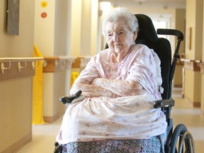 McCormick Home resident Mary Elsie Cameron, 98, wears one of the 32 nightgowns donated to residents of the long-term care facility in London. (CRAIG GLOVER, London Free Press)