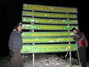 George Esser, left, and his 32-year-old daughter Denise recently climbed to the top of Mount Kilimanjaro. The climb has raised $20,000 for the River City Vineyard's legal battle with the City of Sarnia. (Submitted photo)