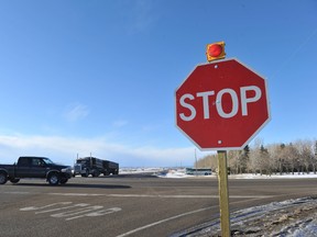 The intersection of Highway 722 (Symons Valley Road) and Big Hill Springs Drive is picture hours after a 39-year-old Airdrie man was killed at the intersection near Airdrie, Alberta on Wednesday, January, 9 2013. 
JAMES EMERY/AIRDRIE ECHO