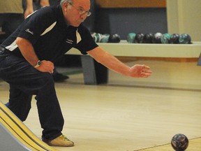 Dennis Claes takes a shot during a five-pin game at the Delhi German Home bowling lanes on Wednesday, Jan. 10, 2013. (SARAH DOKTOR Simcoe Reformer)