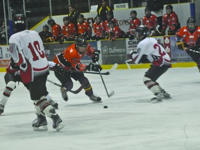 PCI Trojans forward Brodie Blight tries to split the NDSW defence. (Kevin Hirschfield/PORTAGE DAILY GRAPHIC/QMI AGENCY)