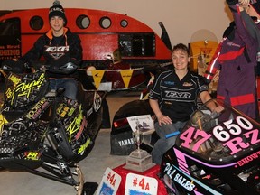 Dave Joanis, on the 2012 Ski-Doo 600RS snowmobile that he raced in last years Cochrane Gold Cup and his mom, Chantal Joanis, on her 1992 Polaris 650, at the Cochrane Classic Vintage Riders Snowmobile Museum.