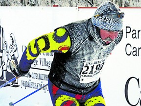 A frosty-looking skier crosses the finish line at a recent running of the Birkebeiner cross-country ski race in Strathcona County. File Photo