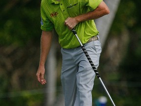 Reuters

David Hearn follows his ball after putting on the third green during the first round of the Sony Open golf tournament in Honolulu on Thursday.