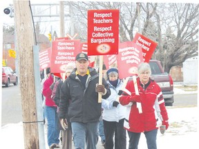 Elementary Teachers’ Federation of Ontario Algoma chapter members during a protest in front of Blind River Public School on Wednesday, Dec. 19 in Blind River. 
Photo by JORDAN ALLARD/THE STANDARD/QMI AGENCY