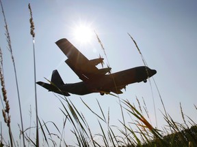 A C-130J Hercules is seen landing at 8 Wing/CFB Trenton, Ont. in August 2012.   -  JEROME LESSARD/THE INTELLIGENCER/QMI AGENCY