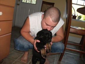 Tyler Dodd and his dog Snickers.